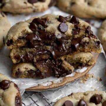 Three halves of Chocolate Filled Cookies oozing delicious warm chocolate goodness.