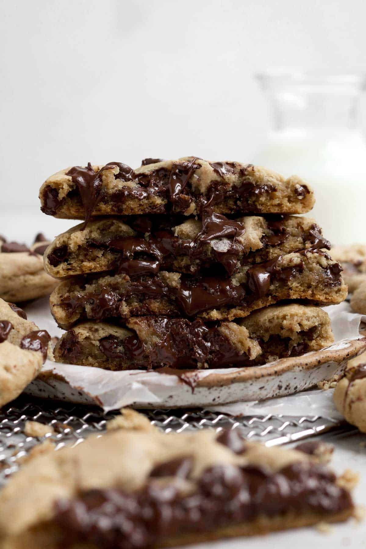 A stack of halved Chocolate Filled Cookies reveals the warm cookie insides.