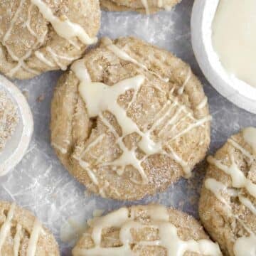 Sugary maple glaze is strewn atop the Brown Sugar Maple Cookies recklessly.