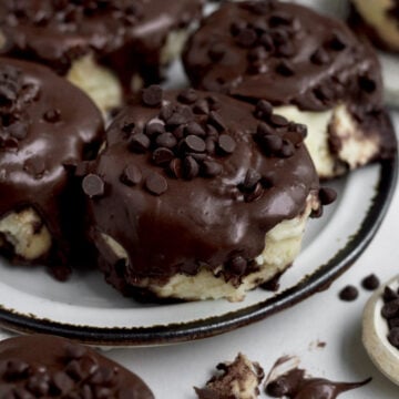 Chocolate and Cinnamon Rolls with a sweet chocolate cream cheese glaze and chocolate chips.