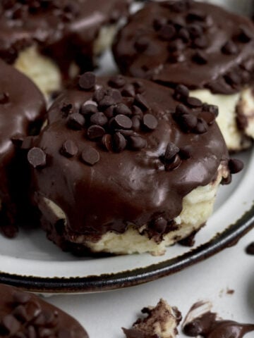 Chocolate and Cinnamon Rolls with a sweet chocolate cream cheese glaze and chocolate chips.