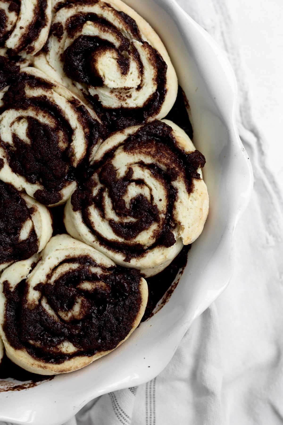 Baking the cinnamon rolls.