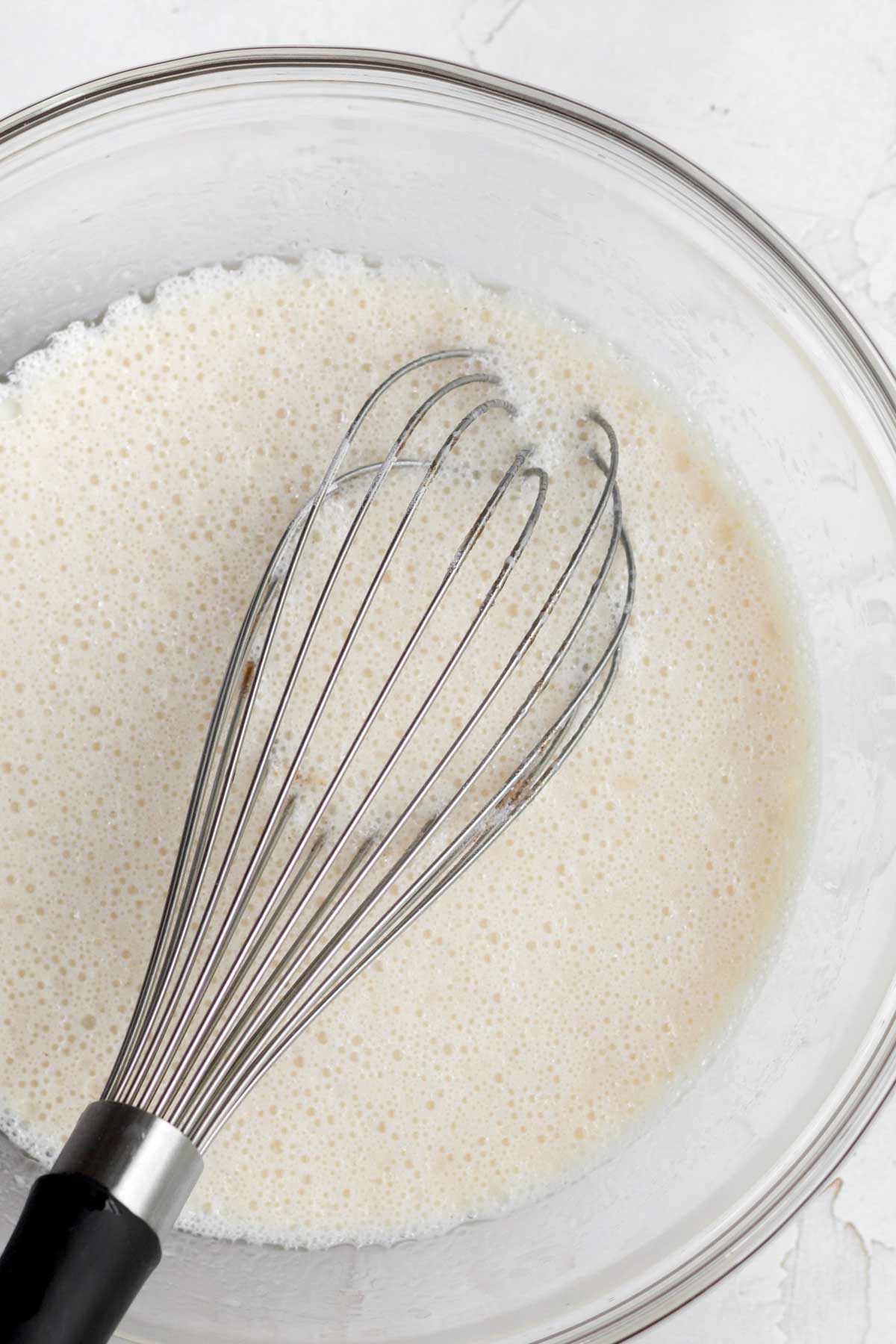 Mixing the wet ingredients with the light brown sugar.