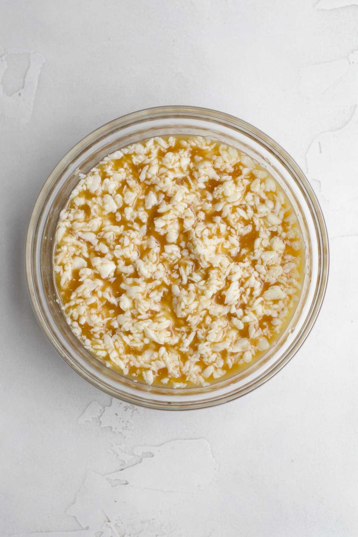 Mixing in maple syrup, vanilla and cornstarch water.