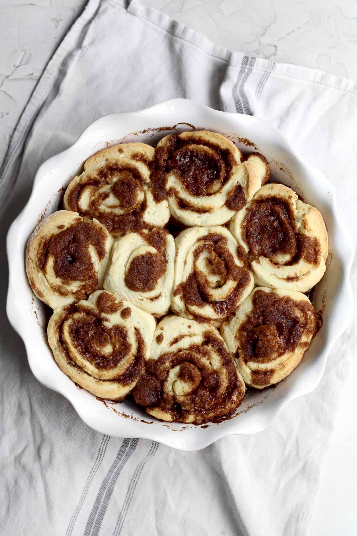 Baking the cinnamon rolls.