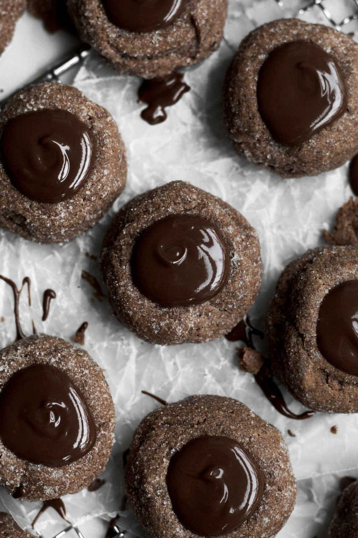 Dark delicious gluten free Chocolate Thumbprint Cookies coated with crystalized granulated sugar.