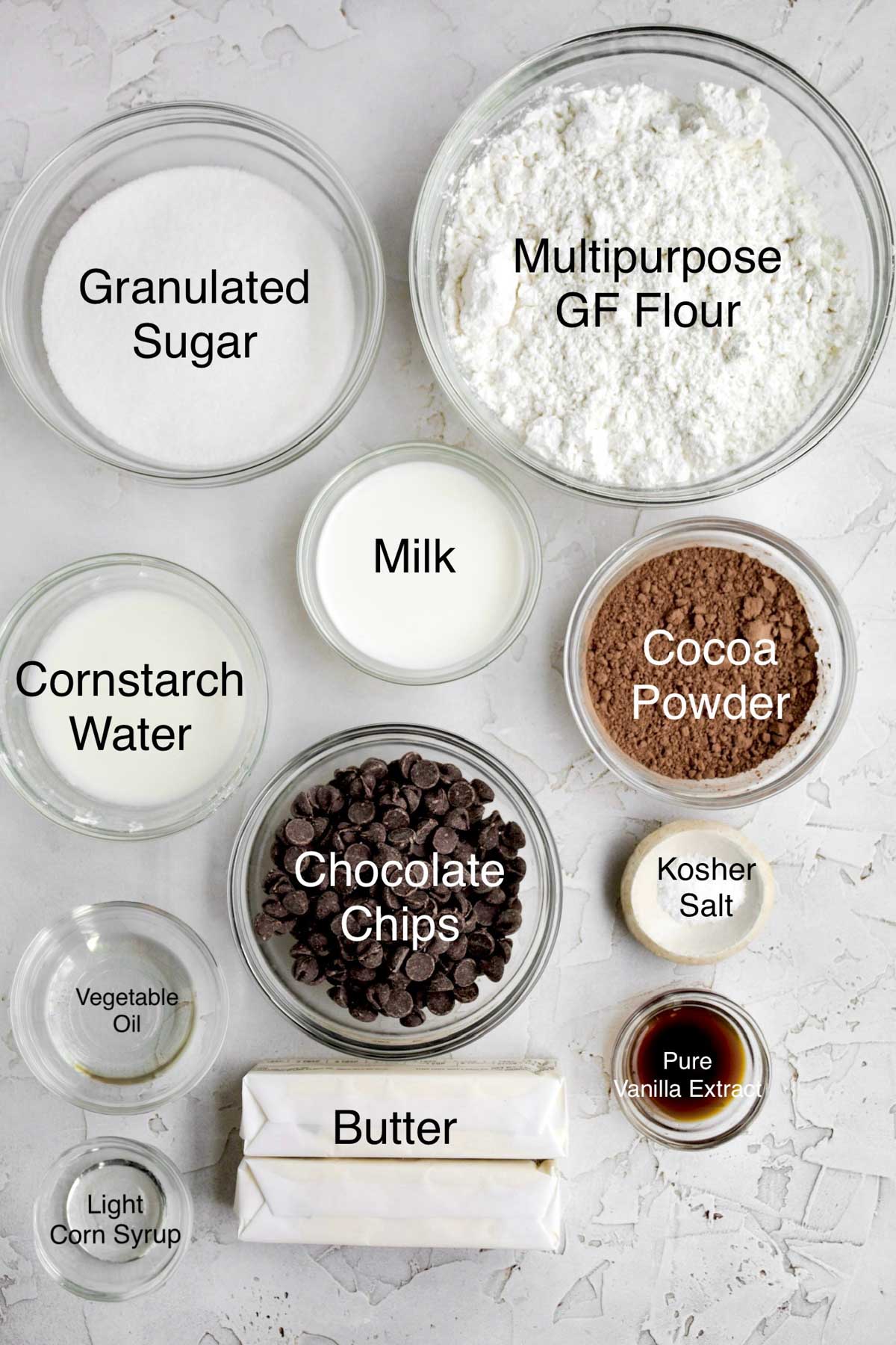 Granulated sugar, multipurpose gluten free flour cornstarch water, milk, cocoa powder, chocolate chips, light corn syrup, vegetable oil, kosher salt, pure vanilla extract, and butter.