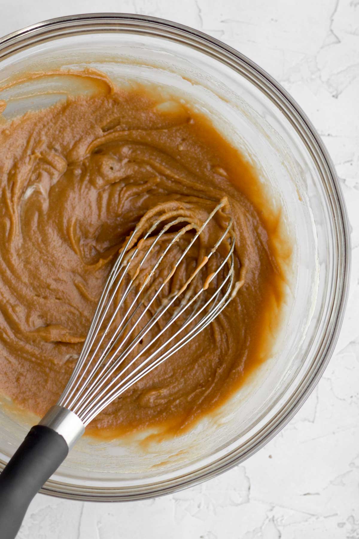 Mixing the wet ingredients together.