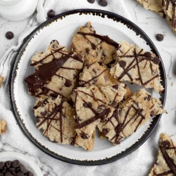Gluten free cookie brittle broken into crisp pieces with delicious chocolate drizzle.