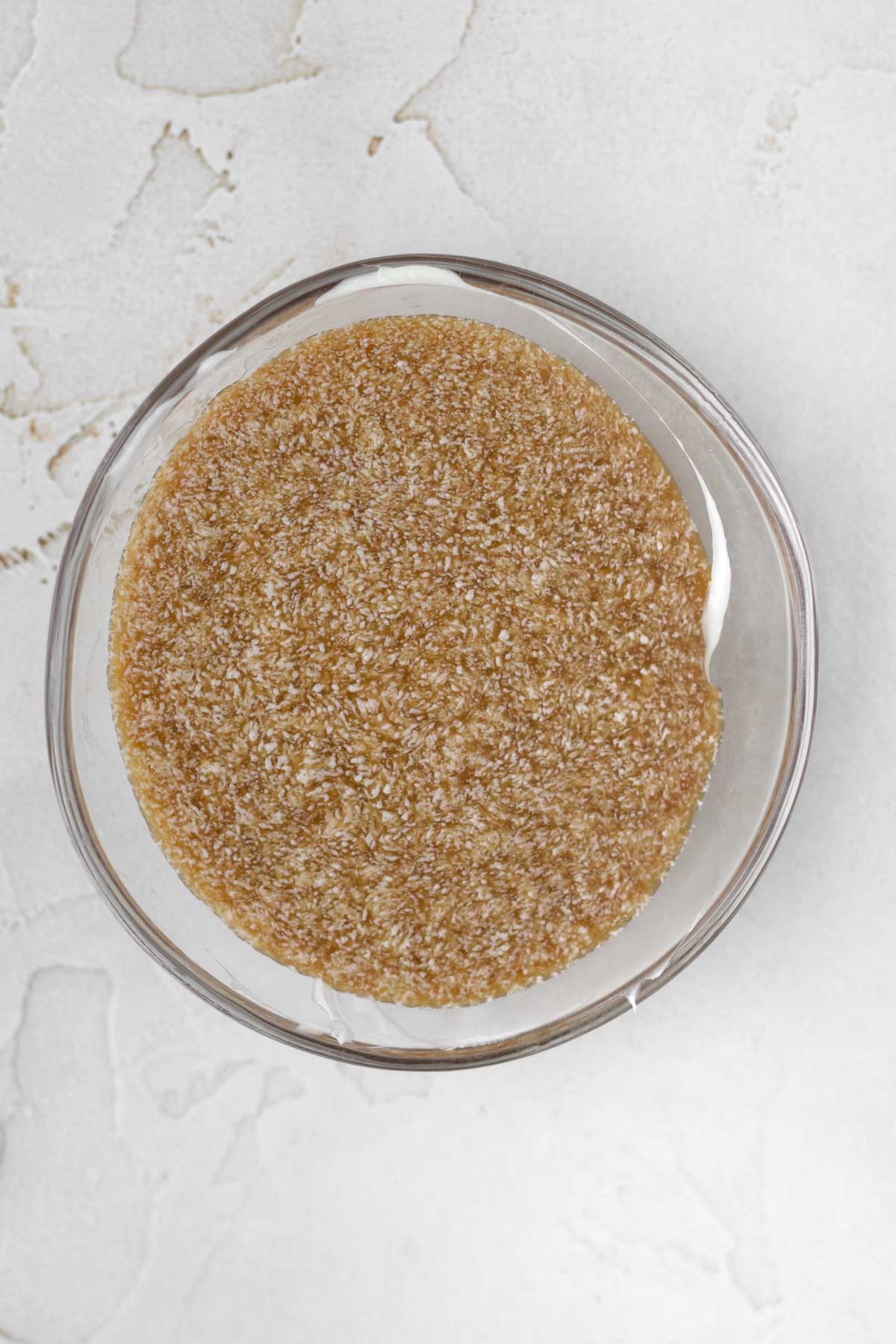 Wet ingredients mixed into the melted butter.