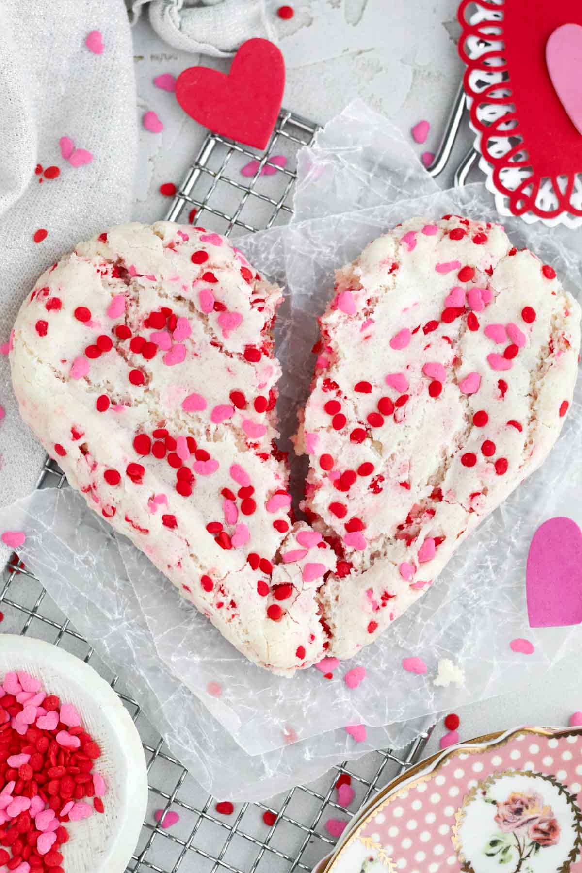 A broken heart Valentine's Day Sugar Cookie with a soft interior and crispy outer layer.