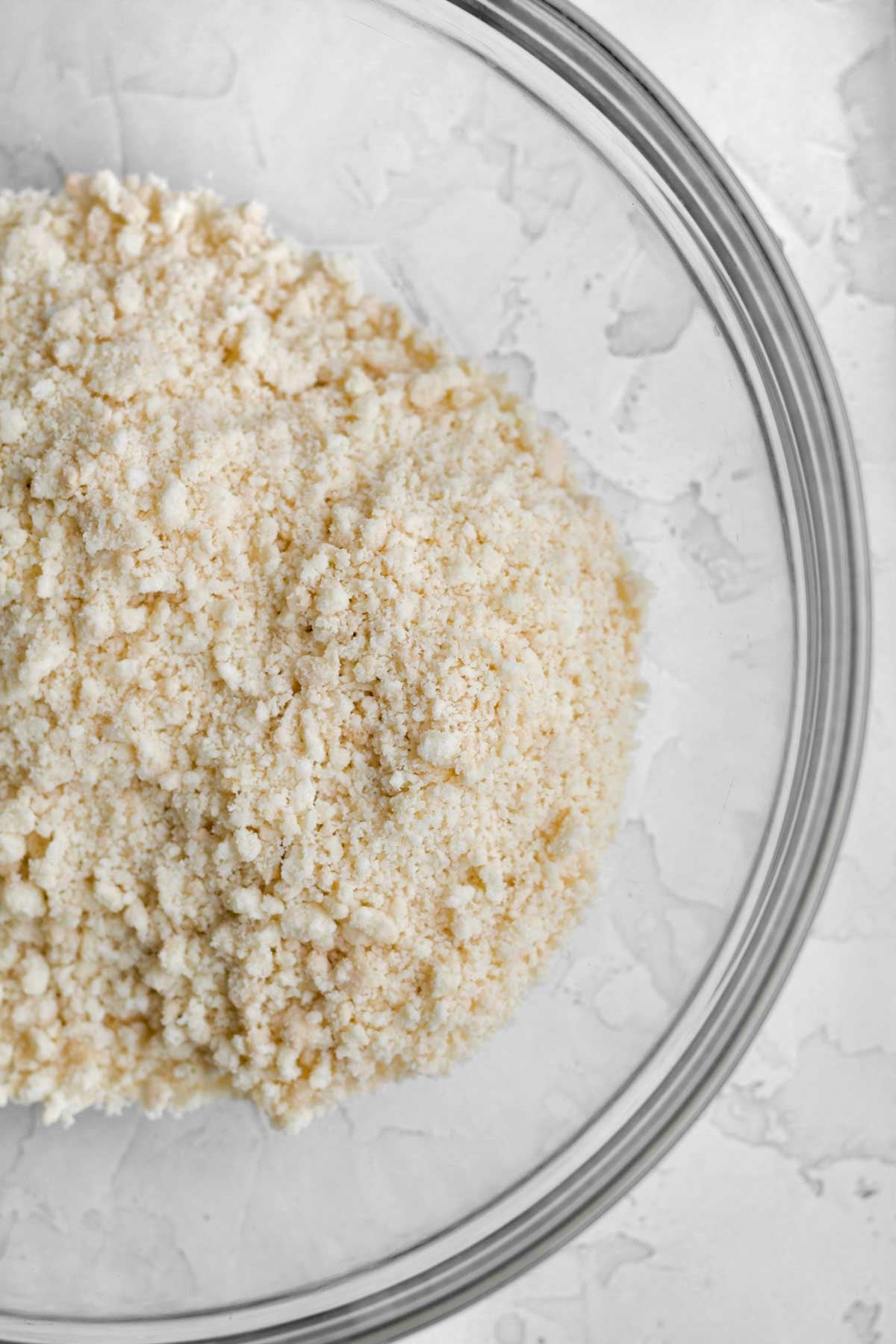 fine-broken up vanilla sandwich cookies in a bowl.
