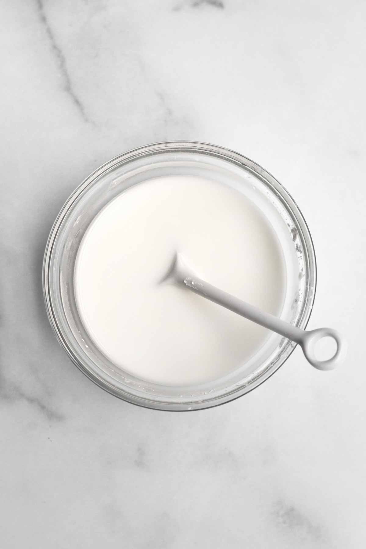 milky white cornstarch water in a bowl.