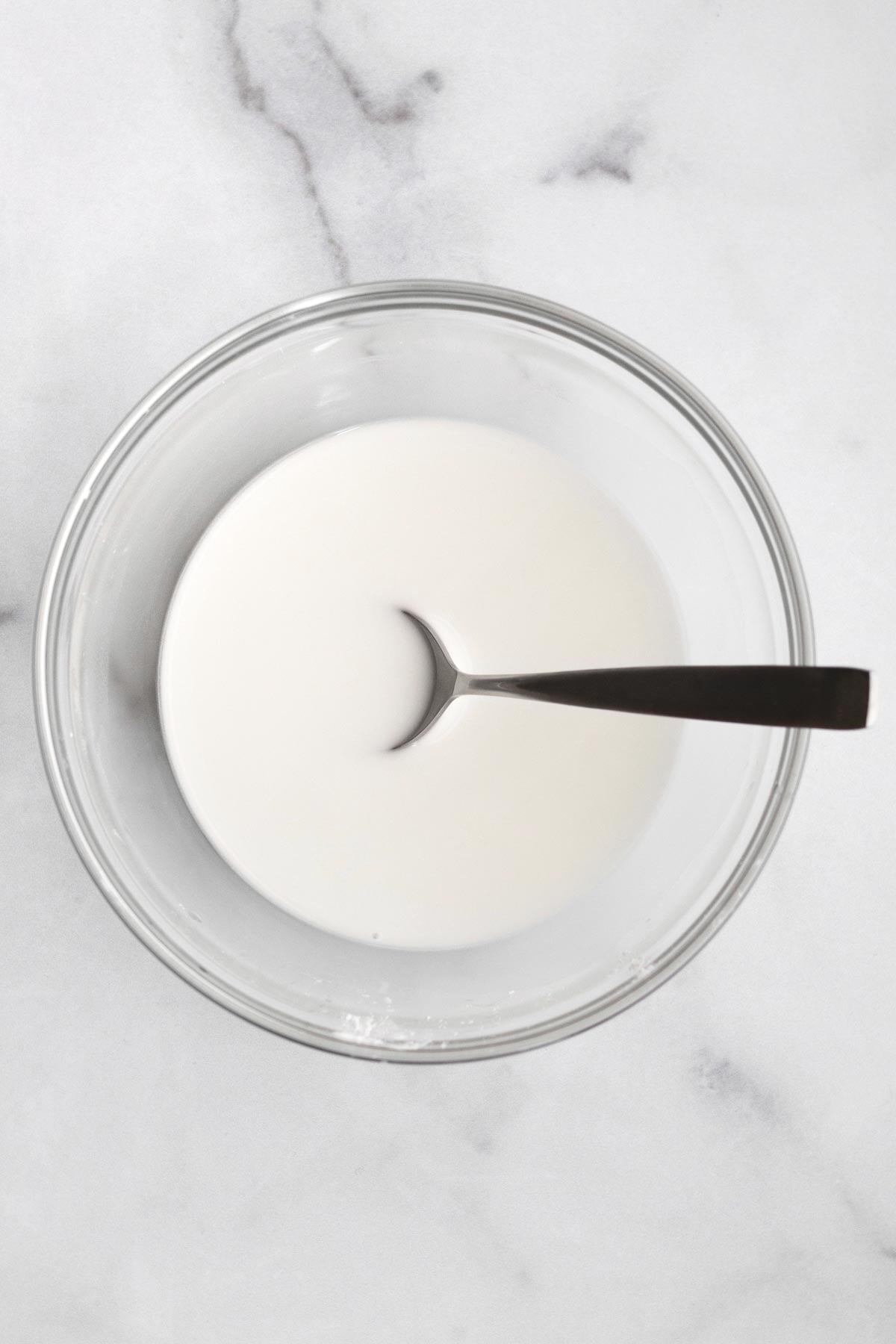 milky white cornstarch water in a bowl.