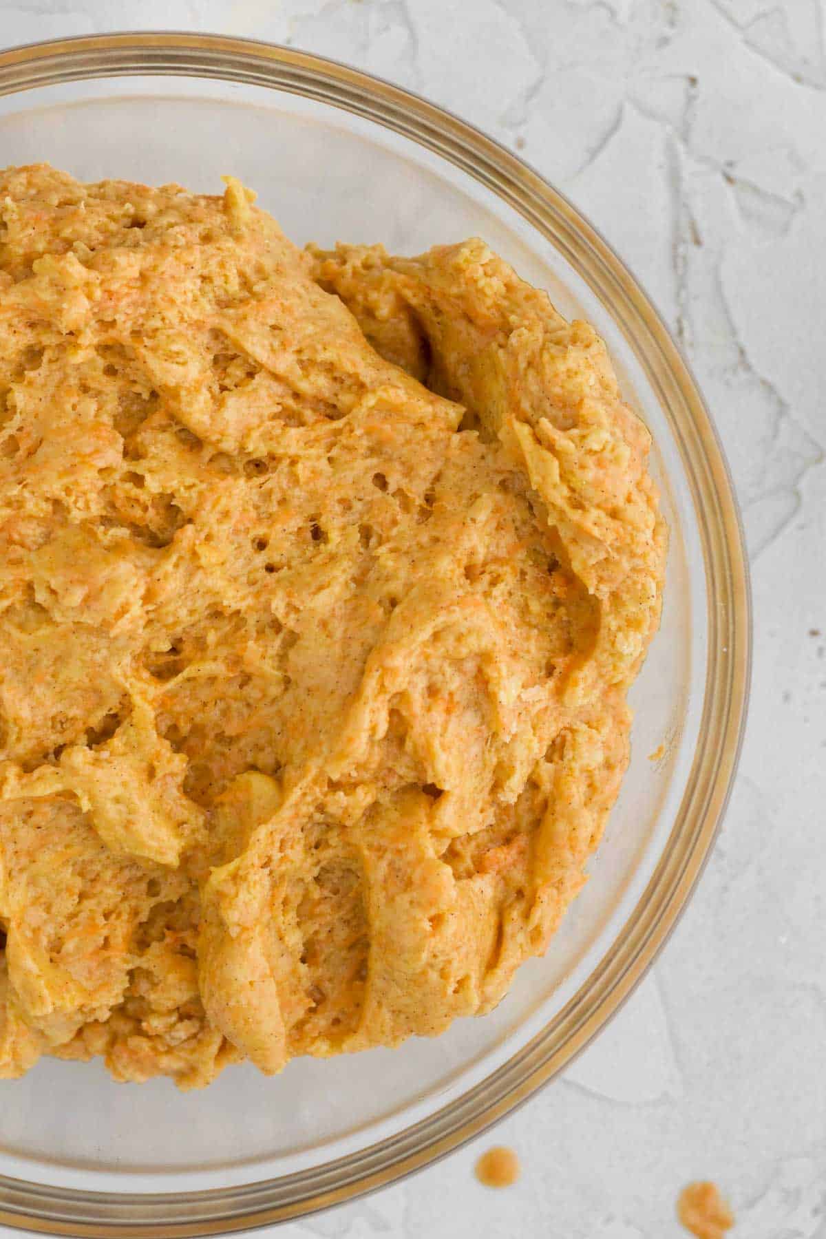 the carrot flecked orange cake batter.