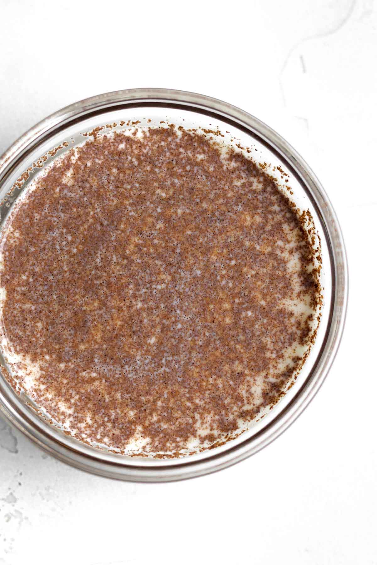 milk mixed with brown cinnamon.