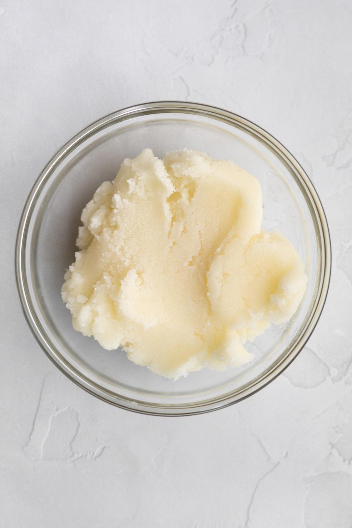 Creamed butter and sugar in a bowl.