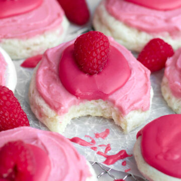 bite through a cascade of sweet flavors in this raspberry cheesecake cookie reveals its soft center.