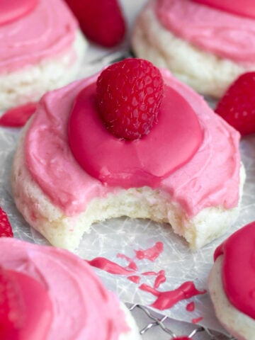 bite through a cascade of sweet flavors in this raspberry cheesecake cookie reveals its soft center.