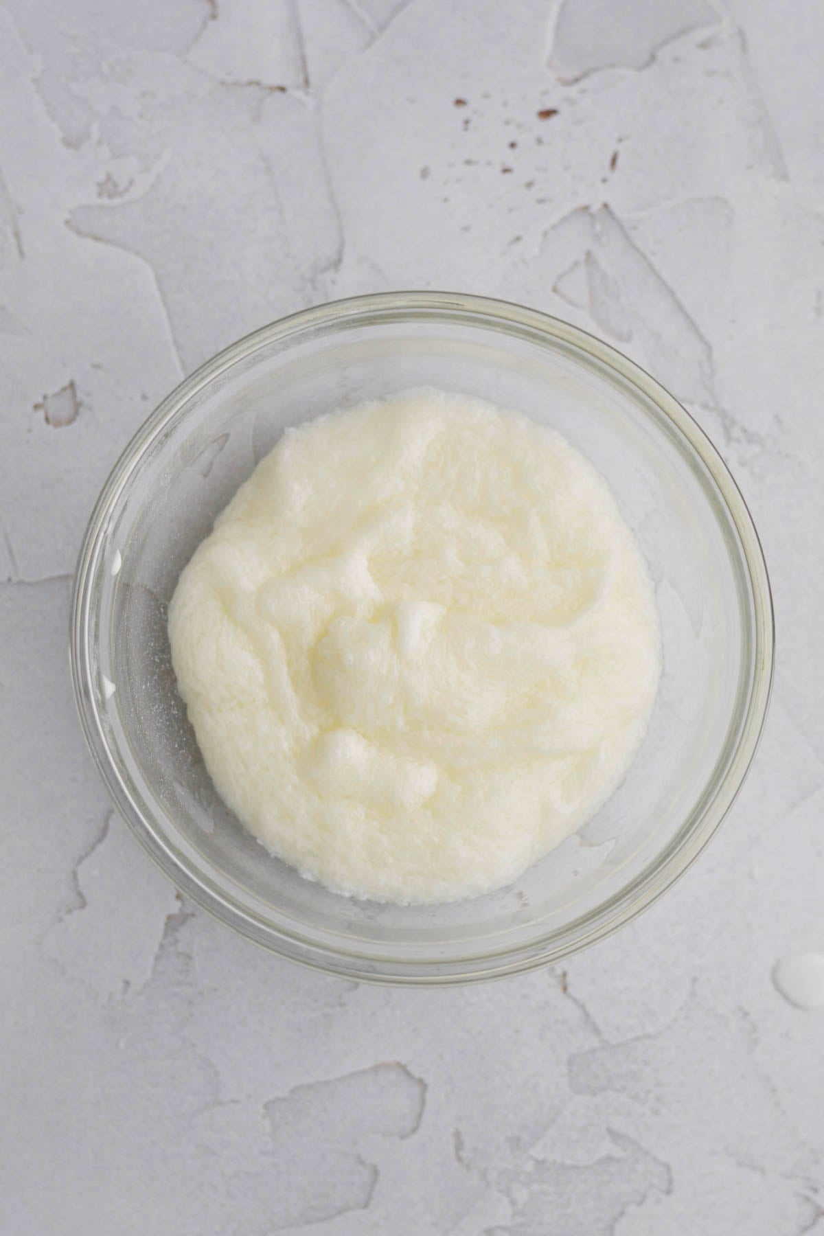 Mixing in sugar and cornstarch water into the melted butter.