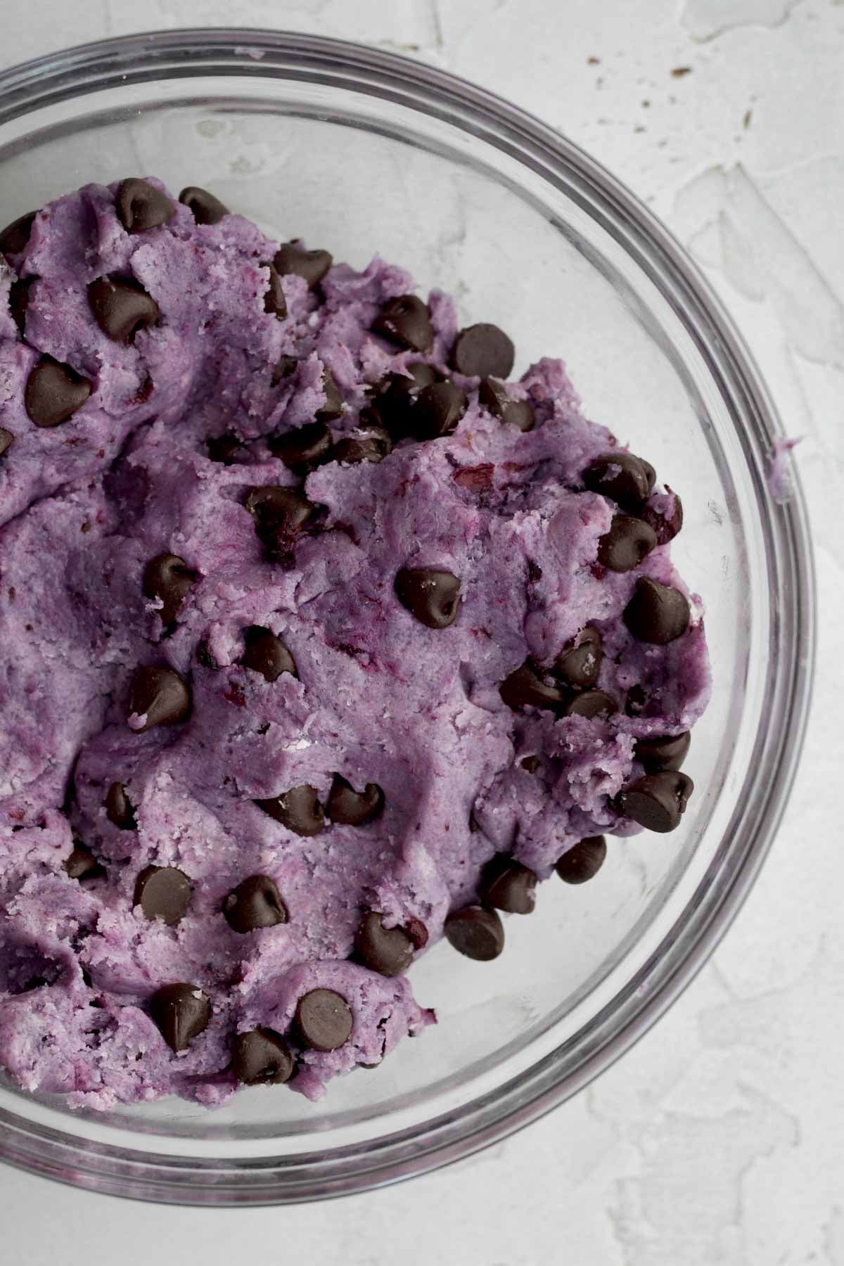 Purple cookie dough mixed with semisweet chocolate chips.