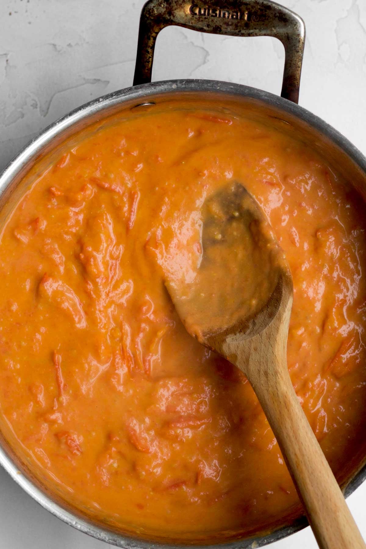 The creamy sauce gets reduced from the heat.