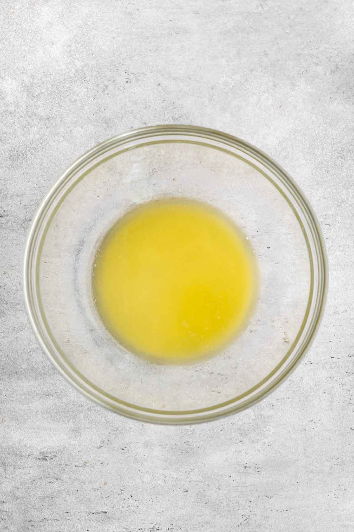 a warm pool of yellow melted butter.