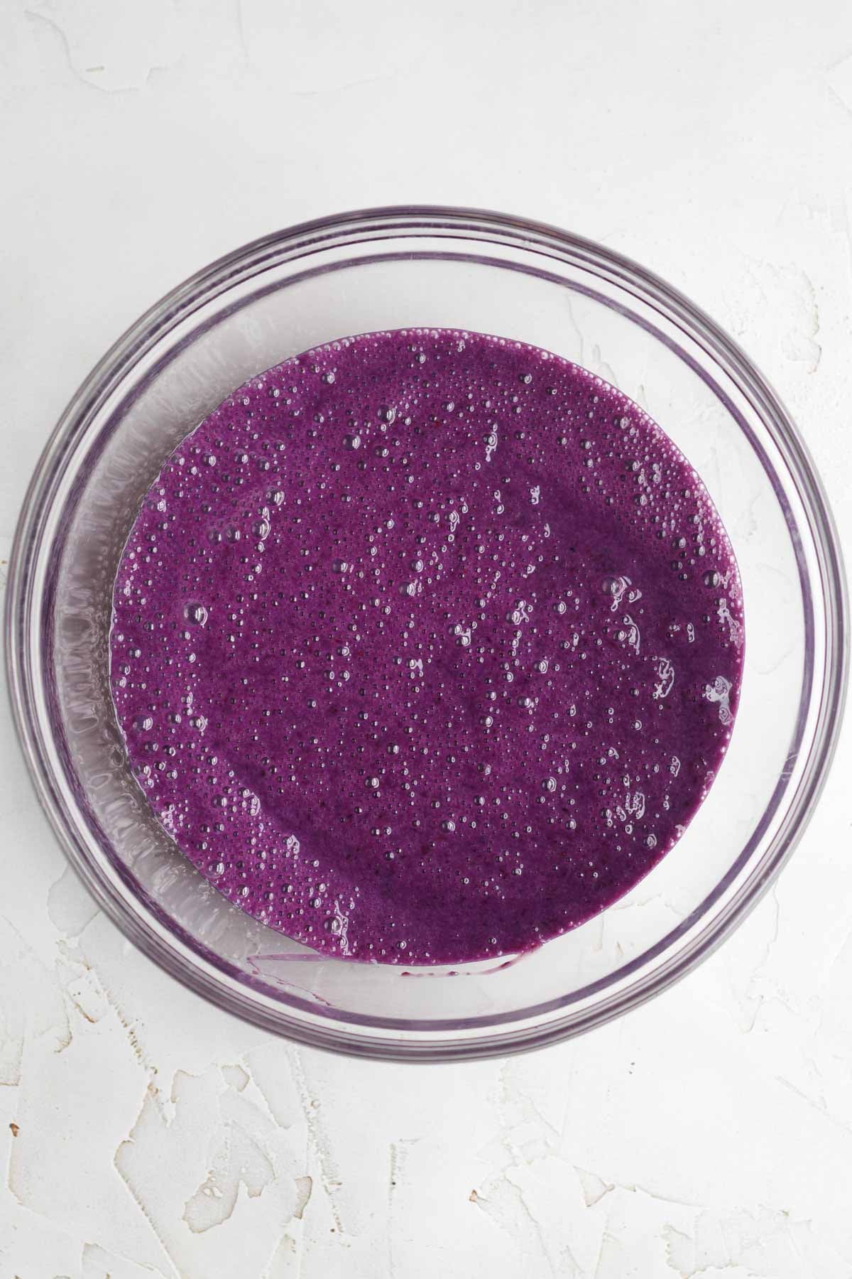 bright purple blueberry liquid in a bowl.