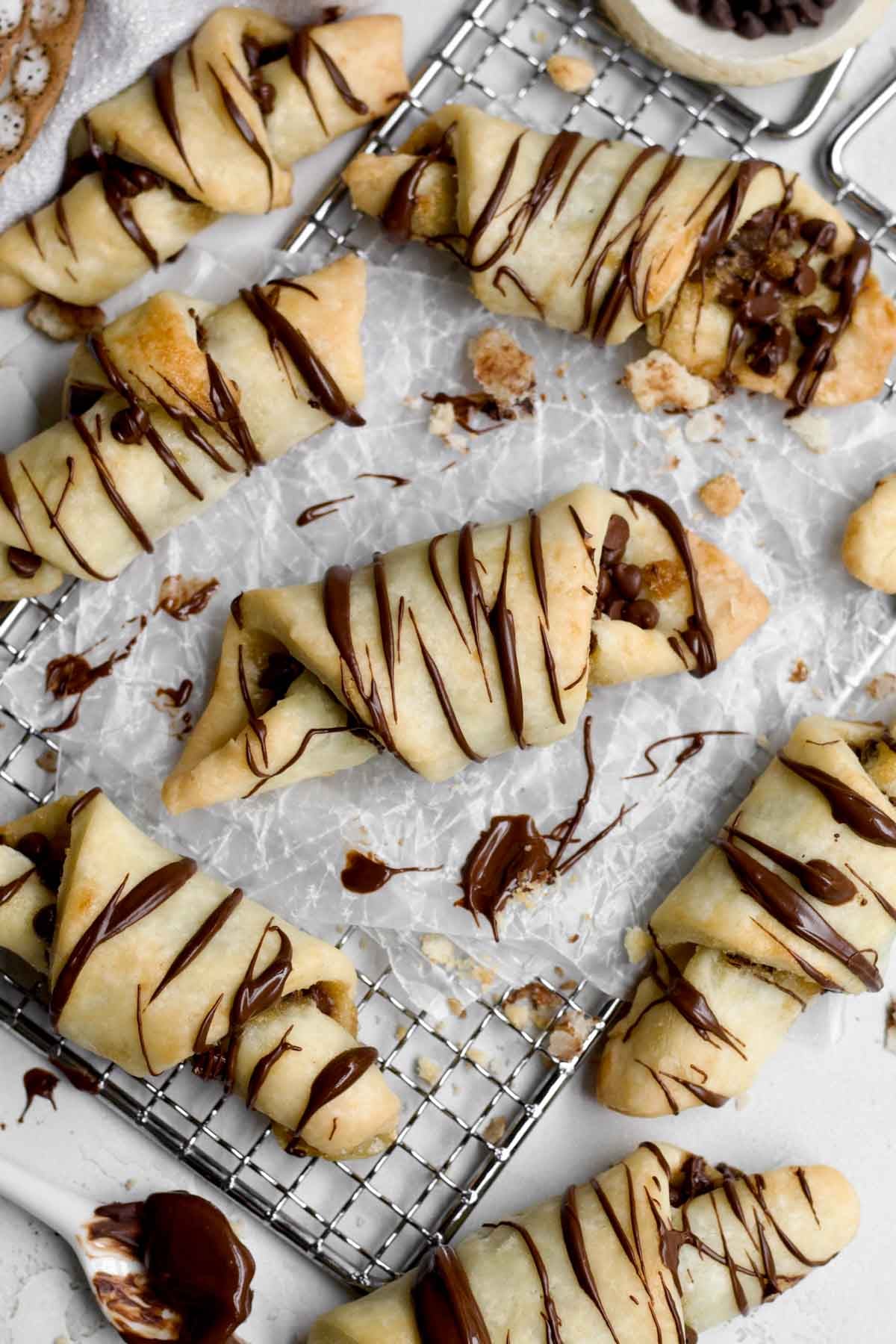 Delicious and crispy chocolate puff pastry twists drizzled in melted chocolate.