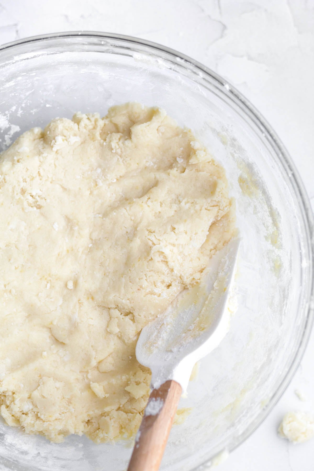 Mixing the wet and dry ingredients to make a peach cookie dough.