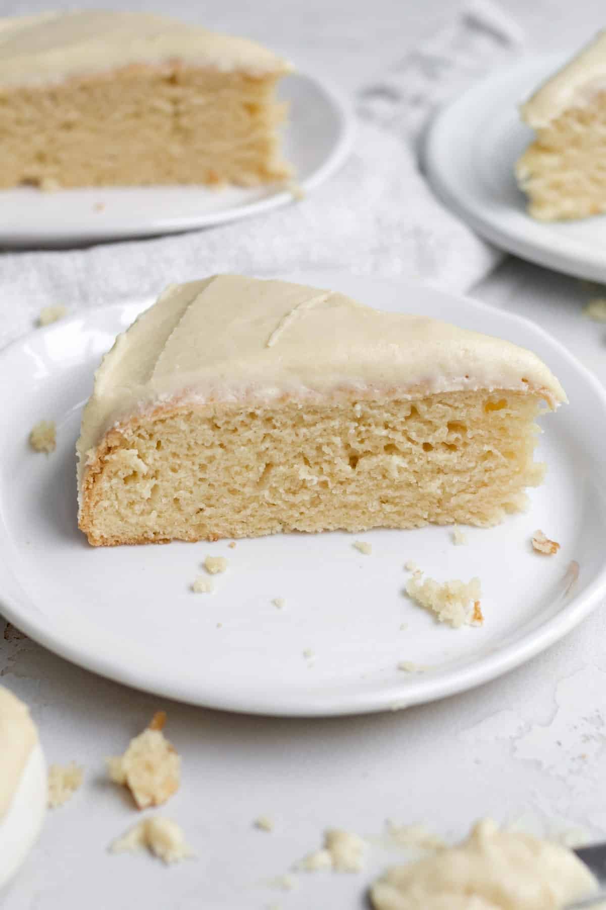 Delicious and sweet maple frosting on a slice of maple cake.
