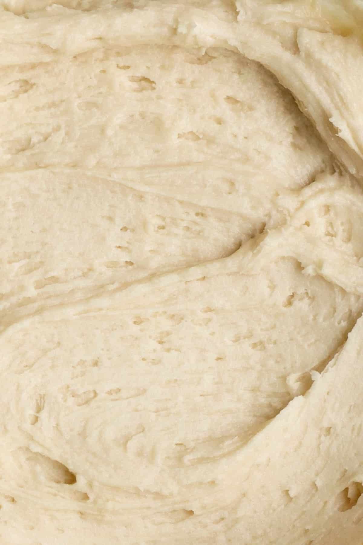 A close-up of creamy and cozy maple frosting.