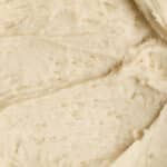 A close-up of creamy and cozy maple frosting.