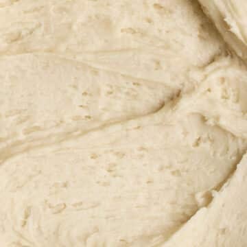 A close-up of creamy and cozy maple frosting.