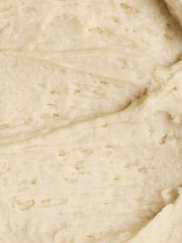 A close-up of creamy and cozy maple frosting.