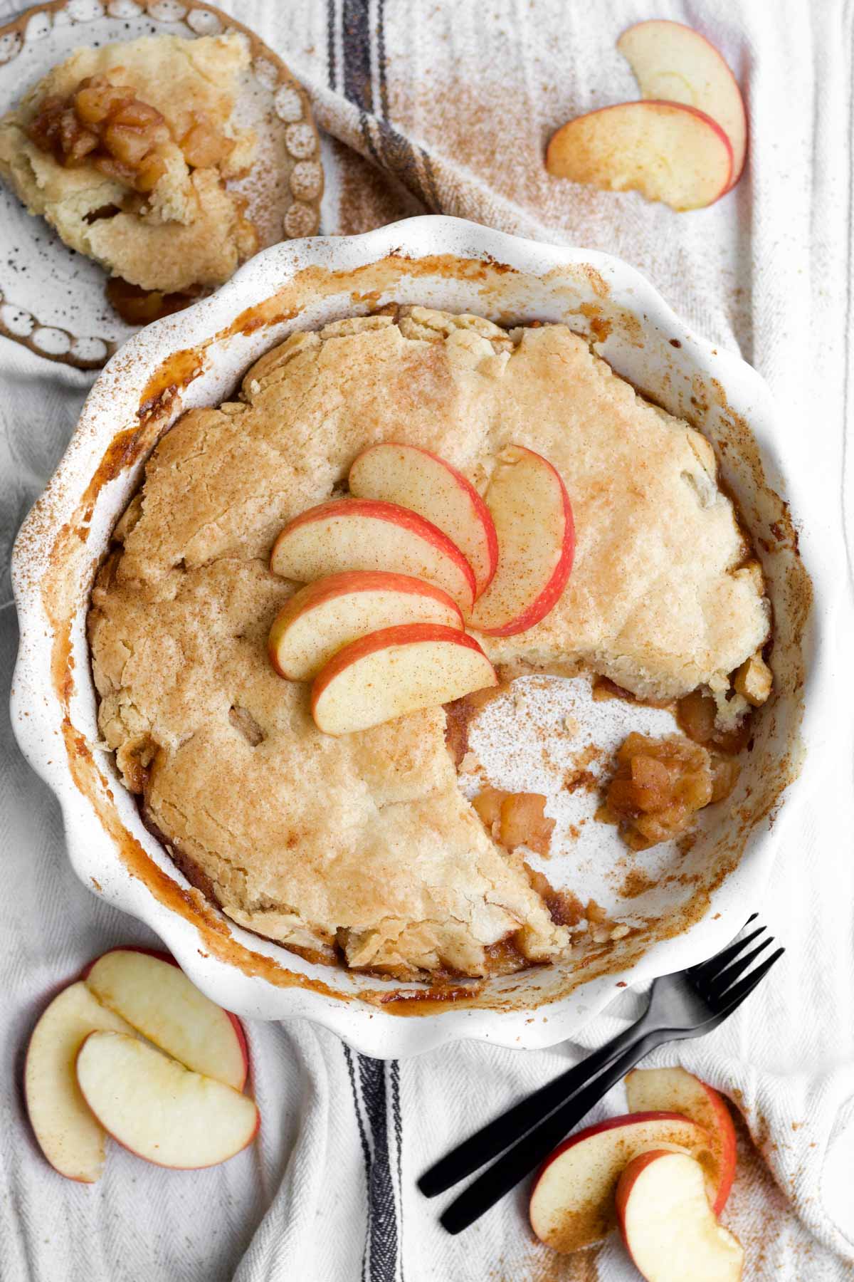 The golden crust of this easy apple cobbler reveals its bubbly, warm peach filling.